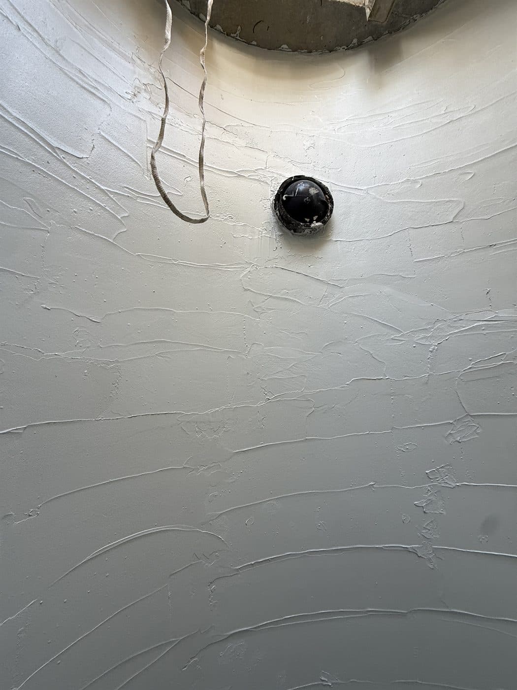 Finished protective coating on the neutralization well